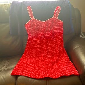 This is a red and white polka dot dress, size 16, the brand is Faded Glory